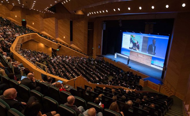 Photo of Microsoft President Brad Smith, speaking to 2000 business leaders, developers and entrepreneurs in Dublin, Ireland, on Oct. 3, 2016