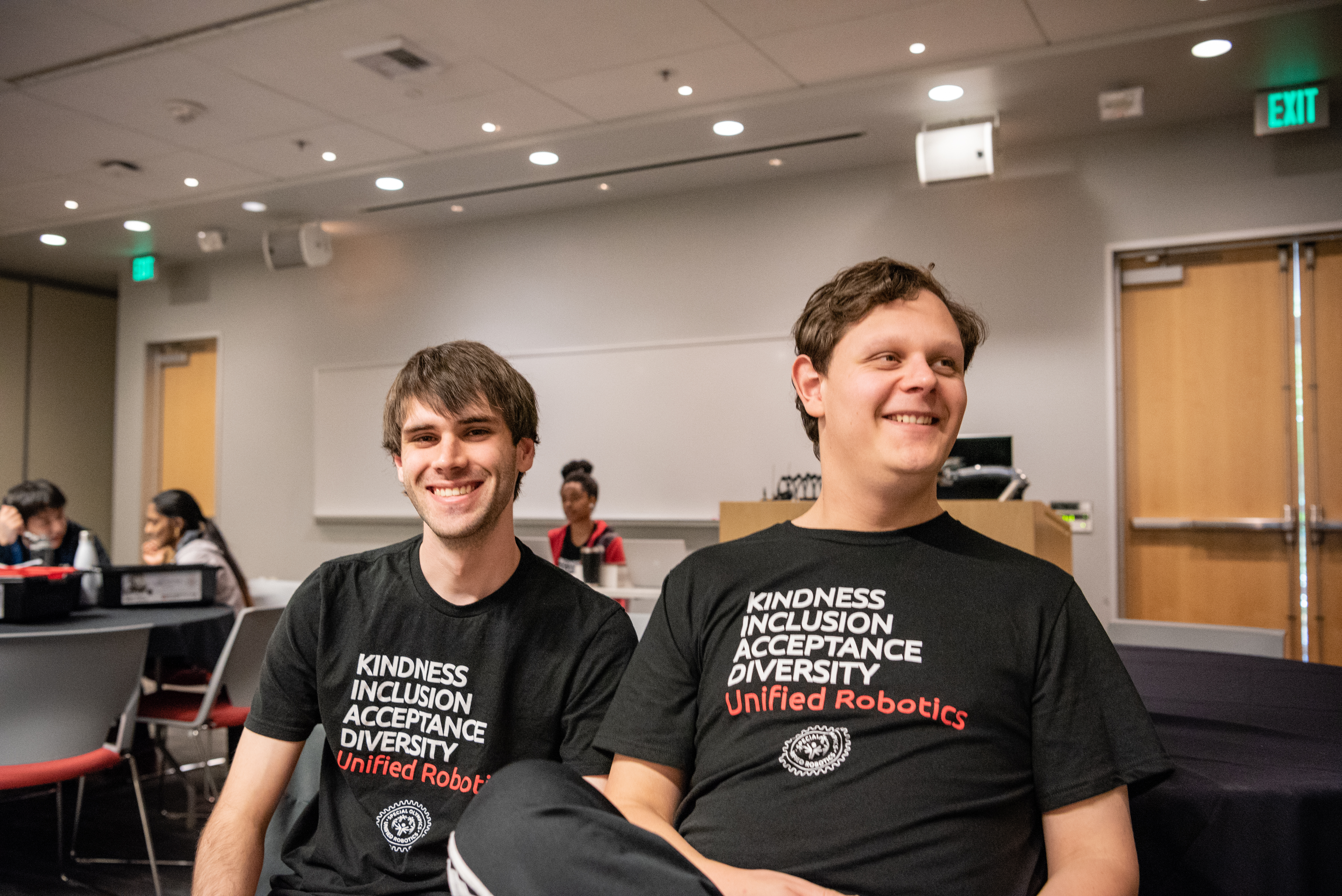 Photo of Payton Ratzliff and Richard Bruk, members of a Unified Robotics team.