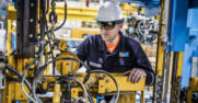 Engineers using HoloLens on the factory floor