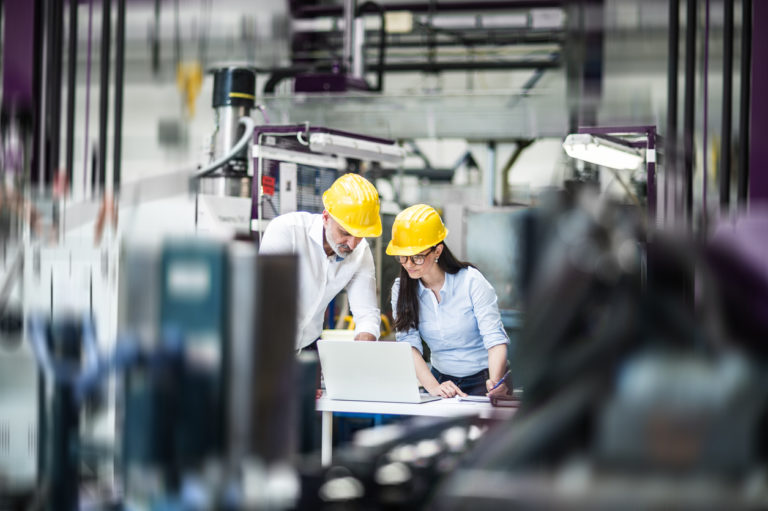 Engineers working hard on the factory floor