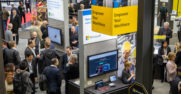 Attendees check out customer solutions in the Microsoft booth at Hannover Messe 2019