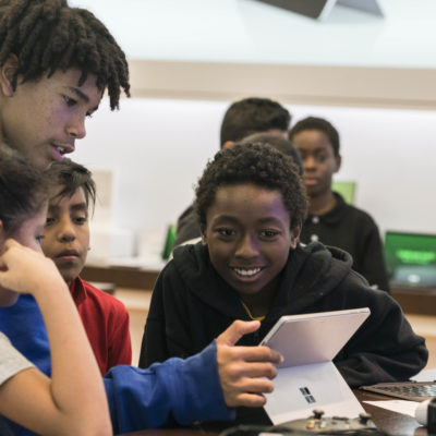 Students learn the basics of building video games with MakeCode Arcade during a free Microsoft Store Summer Camp.