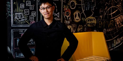 A man standing in front of a chalkboard