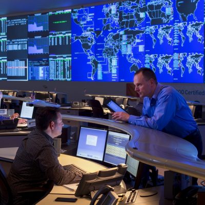 Four AT&T employees at work in the company's Operations Center