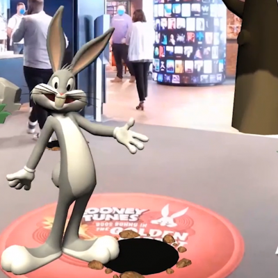 Bugs Bunny in a video store along with a logo reading Powered by AT&T 5G