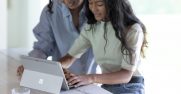 Mother and daughter using a Surface Go 3