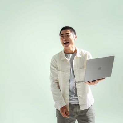 Man holding Surface Laptop Go 2