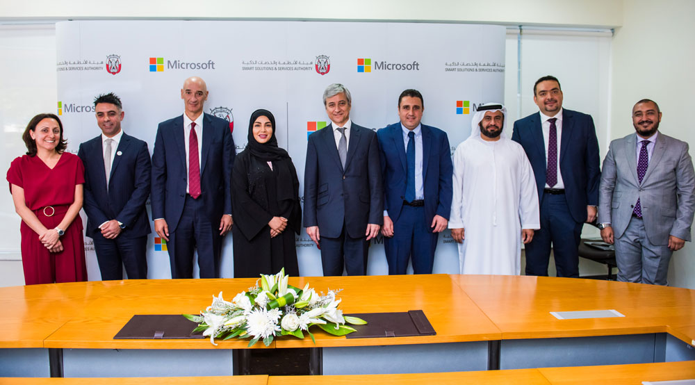 Group photo of key people from ADSSSA and Microsoft who participated in the MOU signing