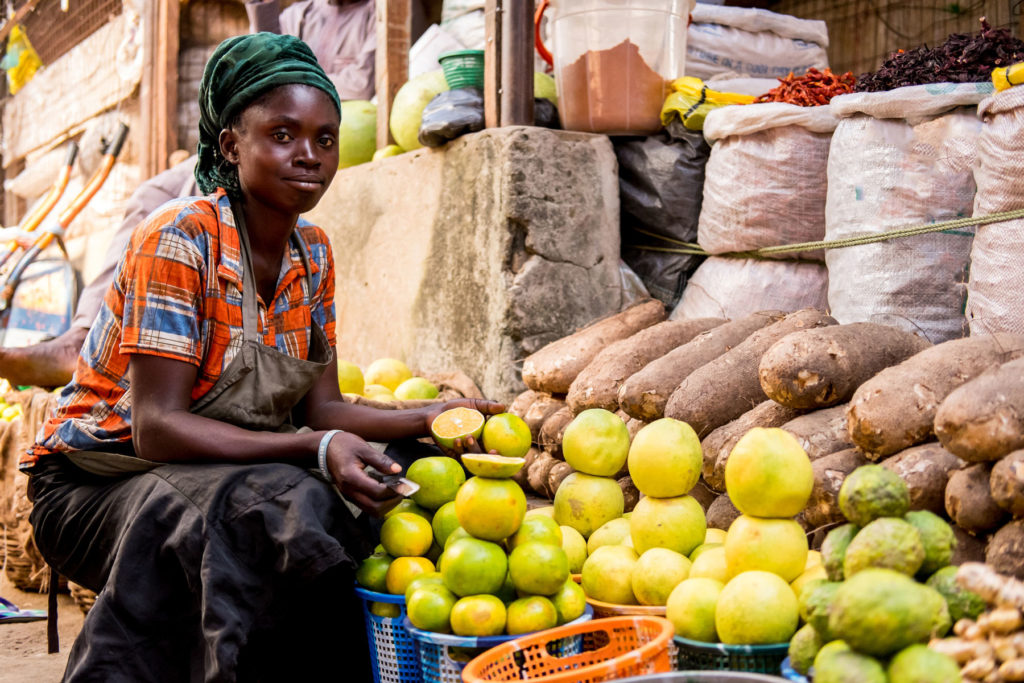 Women selling produce at market