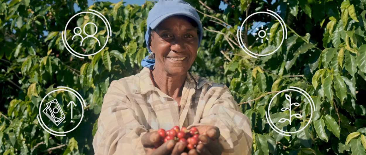 Woman holding fruits in between her hands