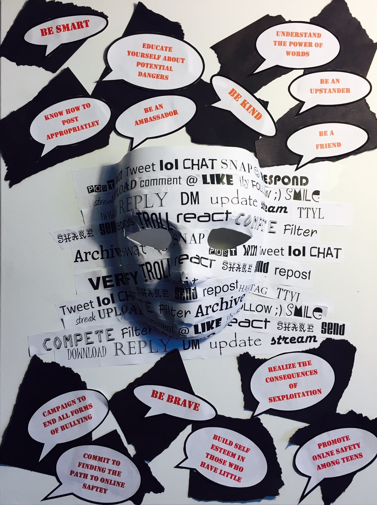 Photo of art project with a black and white mask superimposed on top of phrases like be smart and campaign to end all forms of bullying