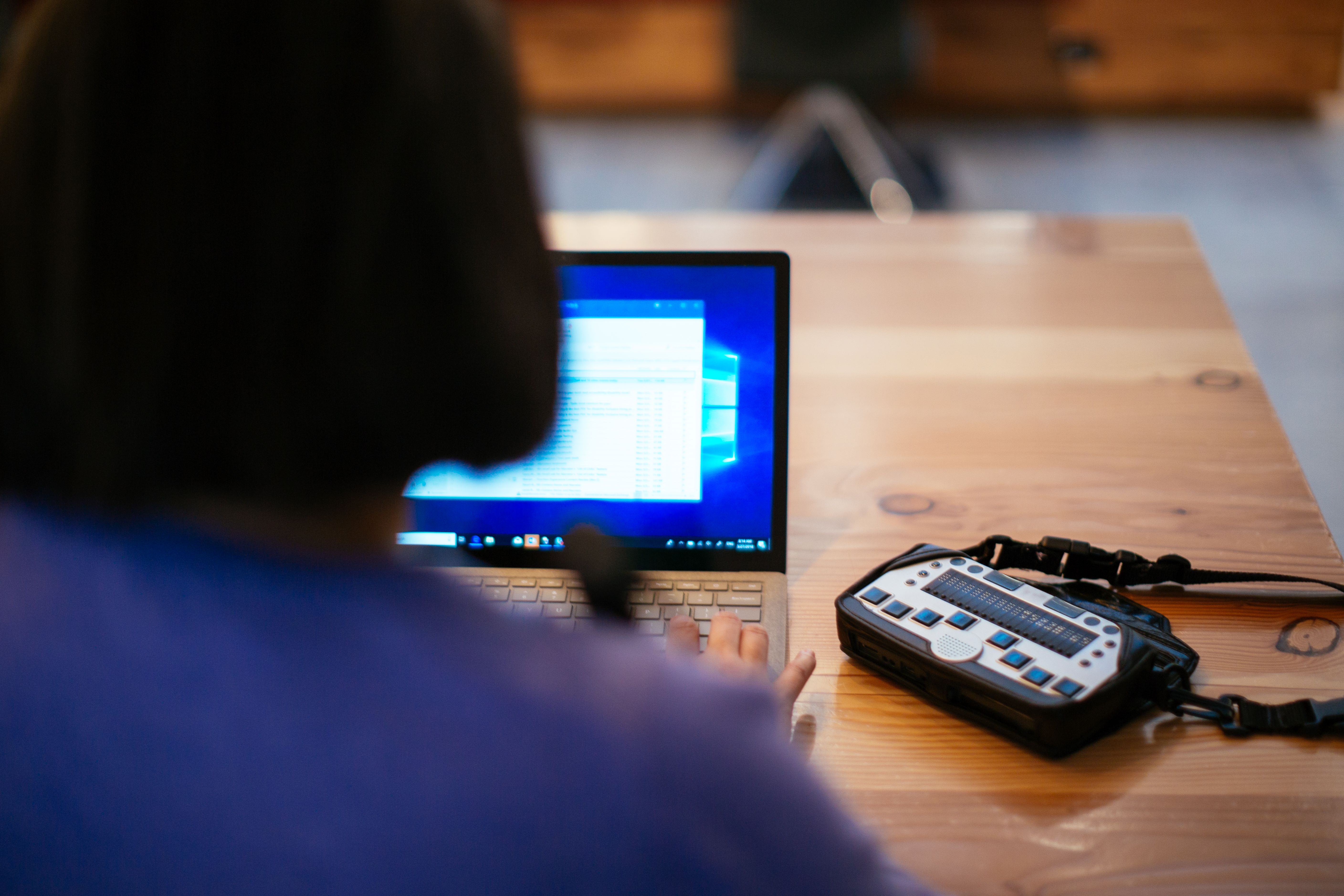 a woman uses an accessibility device