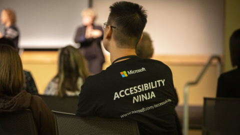 man from behind wearing accessibility ninja t-shirt