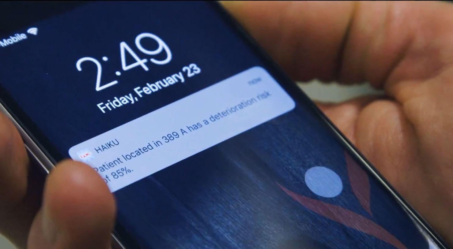 A close-up view of a phone notification that says, 