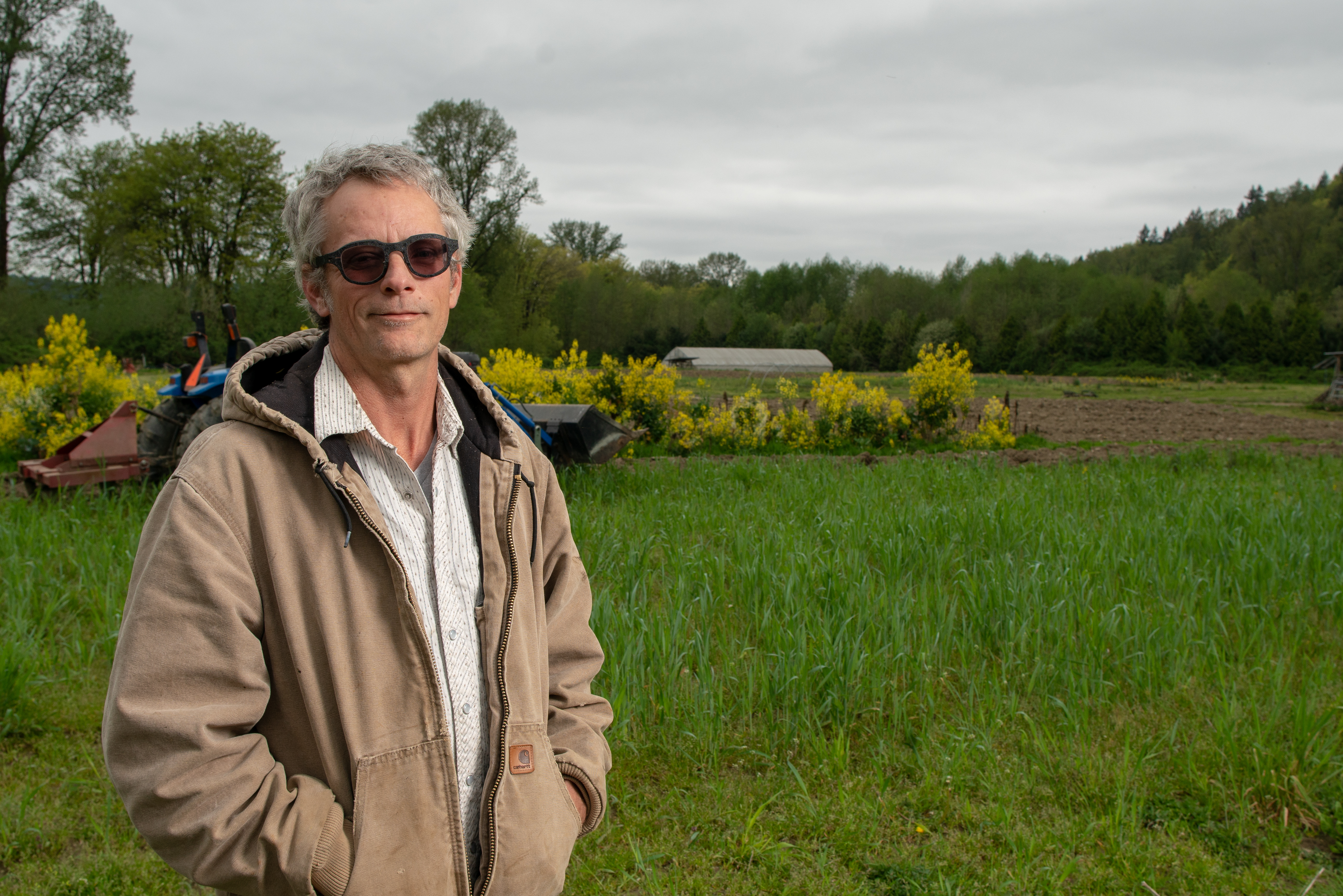 Farmer Sean Stratman in the fields at Dancing Crow Farm