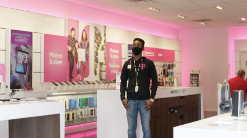 T-Mobile employees at a store set up for safety