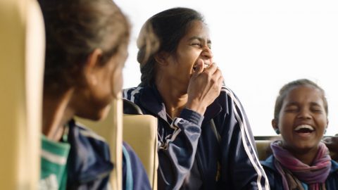 Three girls laughing