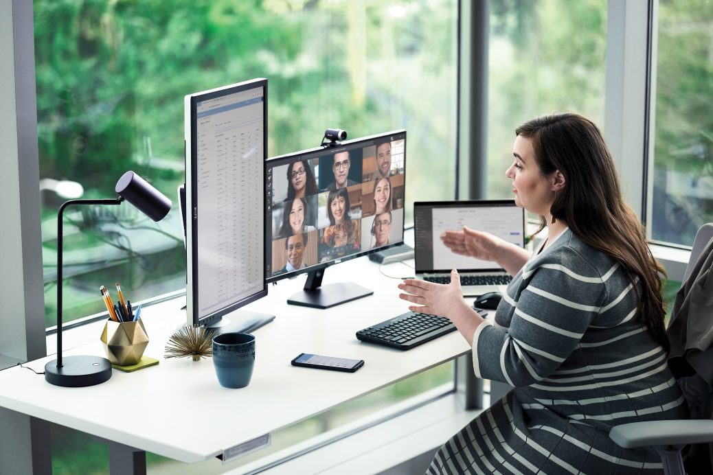 Woman works remotely on Microsoft Teams in a team meeting