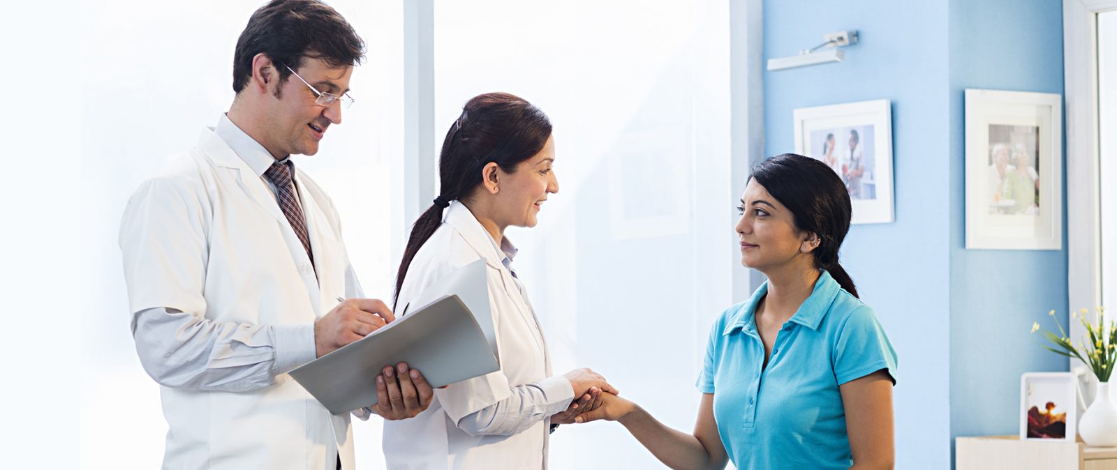 Team of doctor talking to a patient