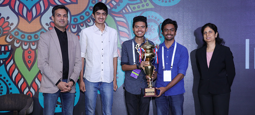 Anant Maheshwari, President, Microsoft India and Aparna Gupta, General Manager (India), Commercial Software Engineering, Microsoft, with the first runner-up, Team DrugSafe