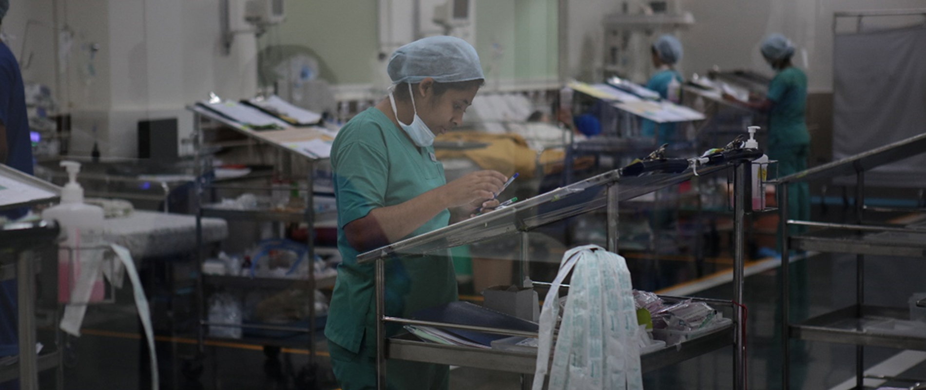 a woman working on a machine