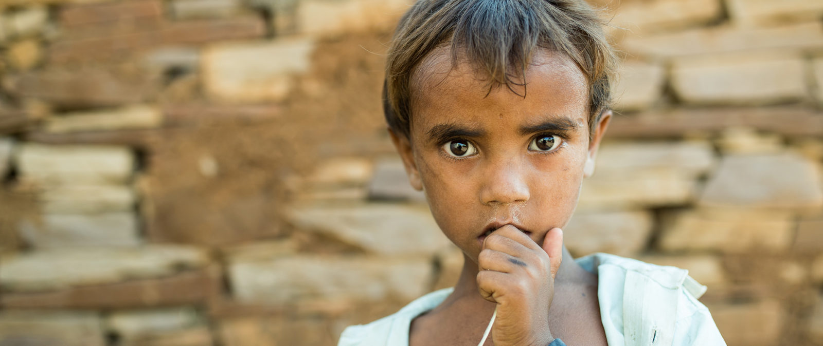 a child looking at the camera