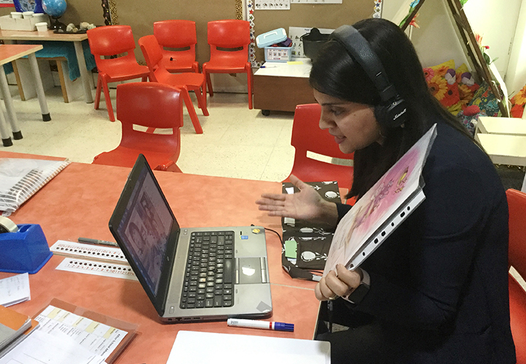 A teacher at The British School holding a class remotely through Microsoft Teams