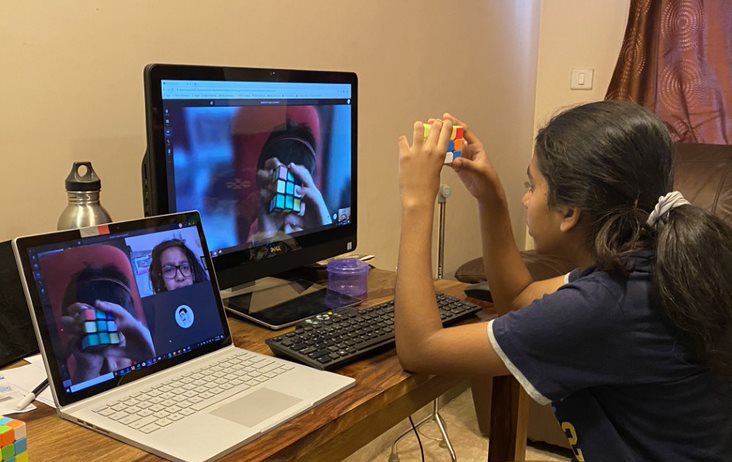 Divya Gopal, a 12 year old girl, is teaching kids how to solve a Rubik’s cube over Microsoft Teams