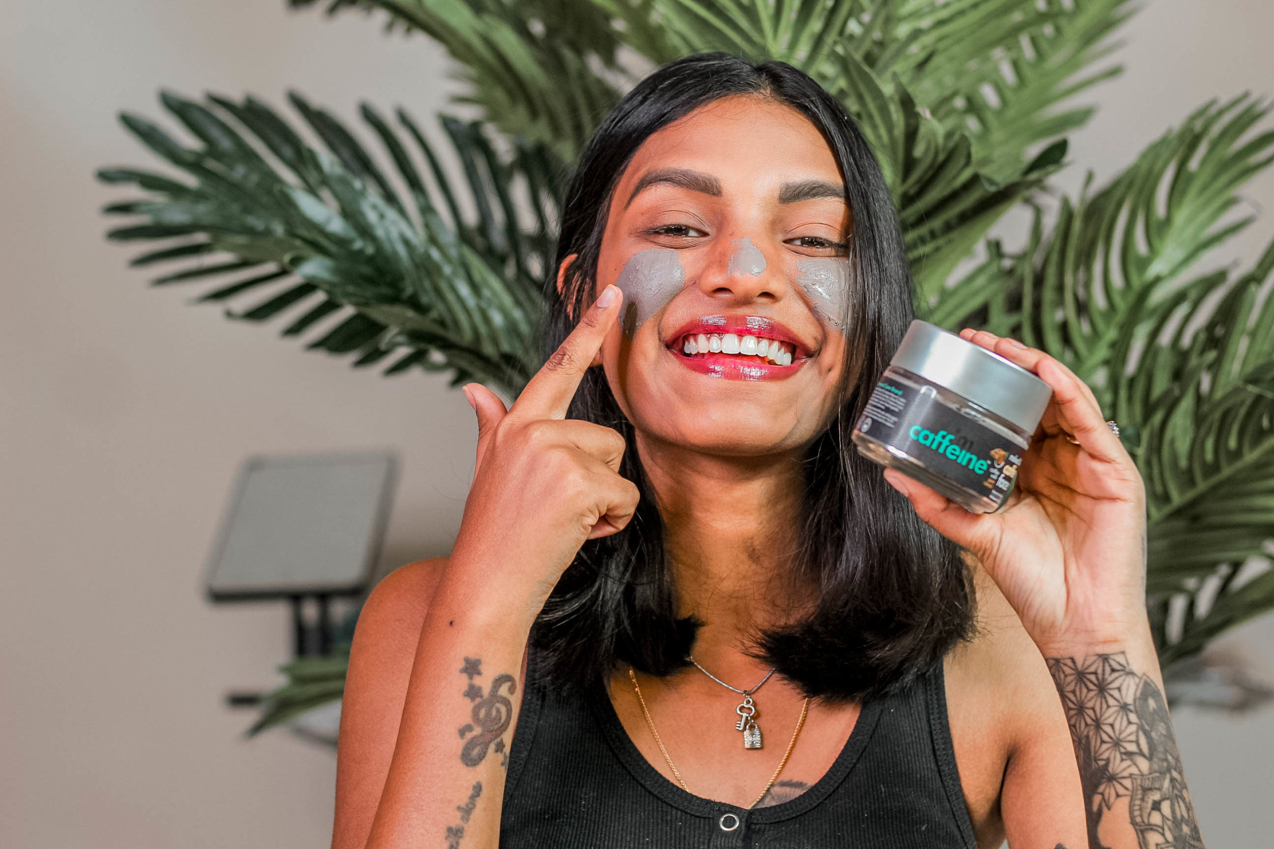 a woman applying a face cream