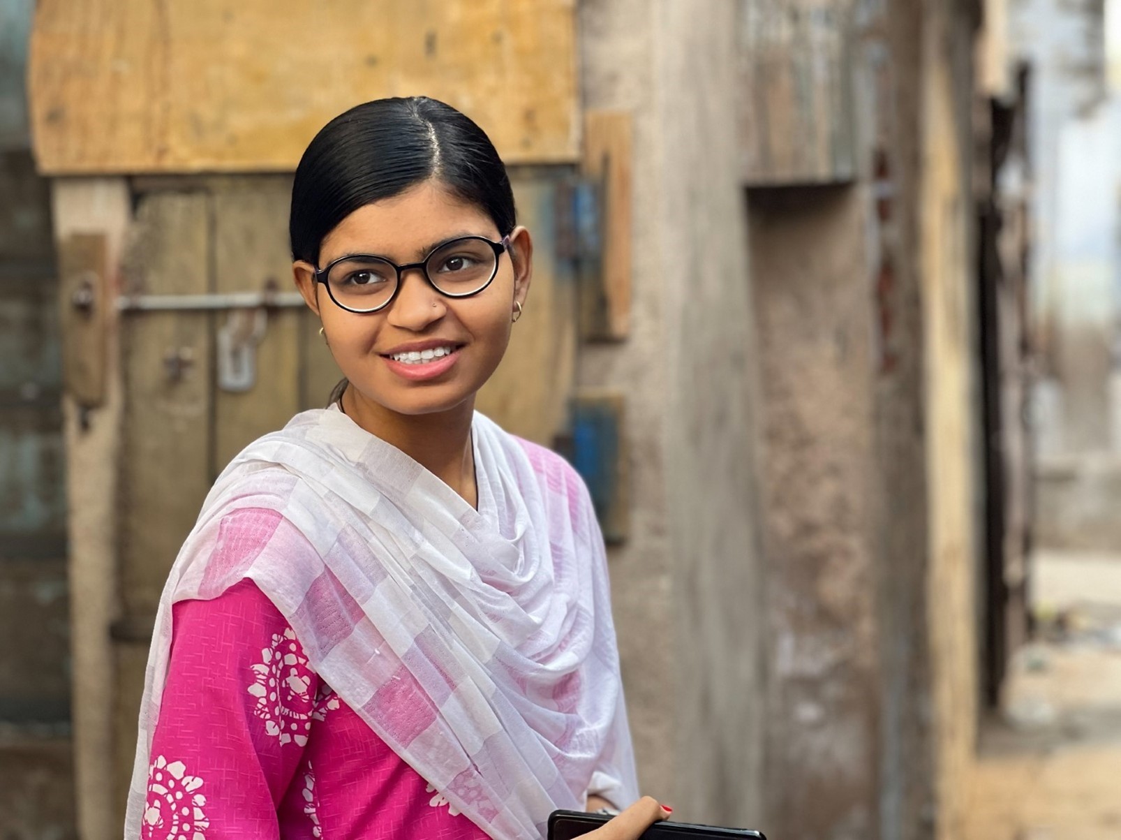 Girl in specs smiling