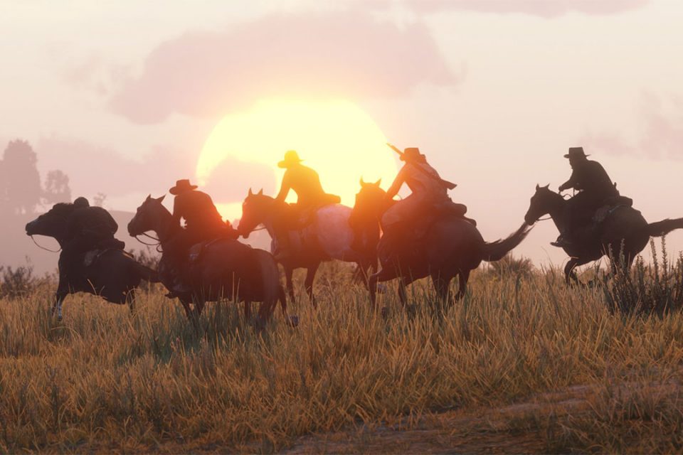 Ковбои на лошадях. Сцена из игры Red Dead Online