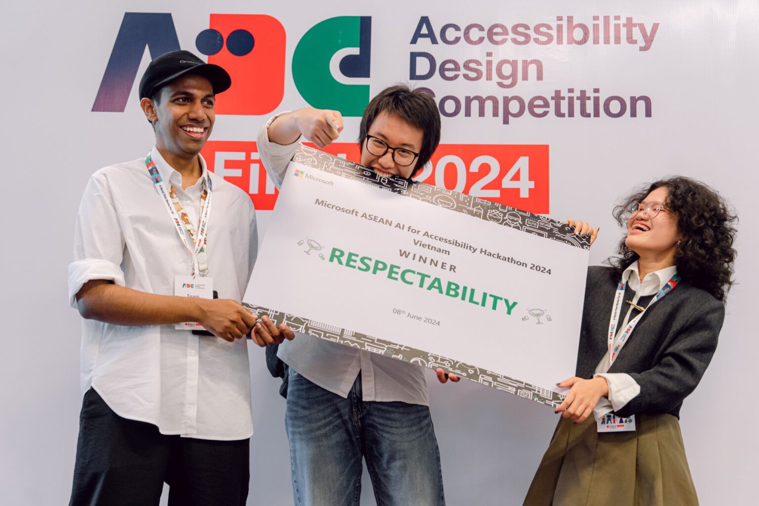 Three members of the winner holding certificate of AI4A Hackathon 2024