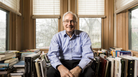 Butler Lampson sits in an office staring into the camera