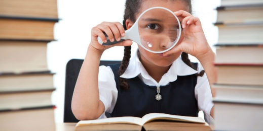 Pretty Young School Girl Reading A Book - csp1928279