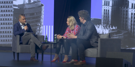 interview on the stage between 3 people