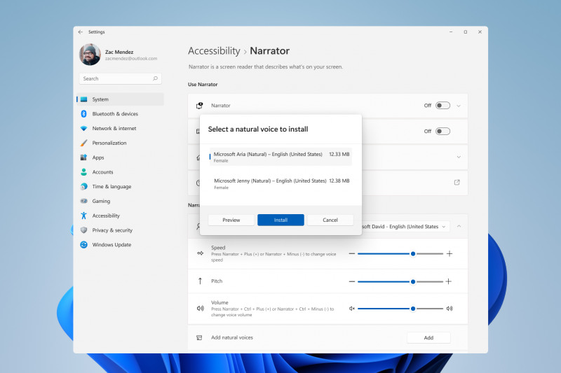 User selecting a natural voice in Narrator in Windows 11; options show Aria and Jenny