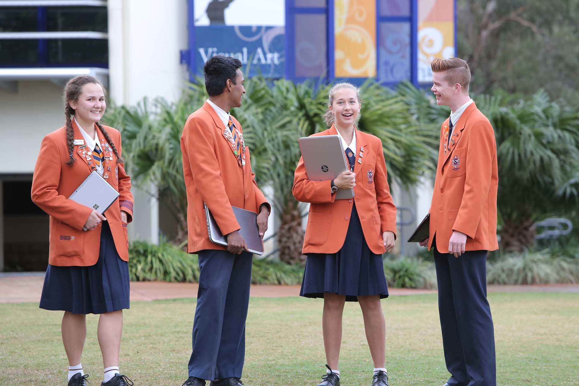 Four Saint Stephens students outside