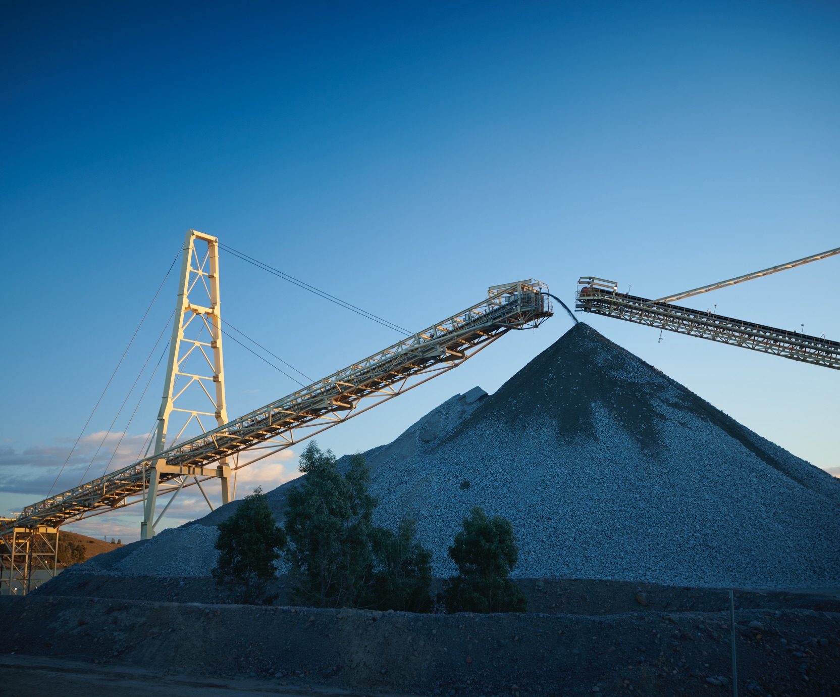 Cranes overlooking a mining facility