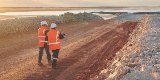 Two adults walking through a resources facility