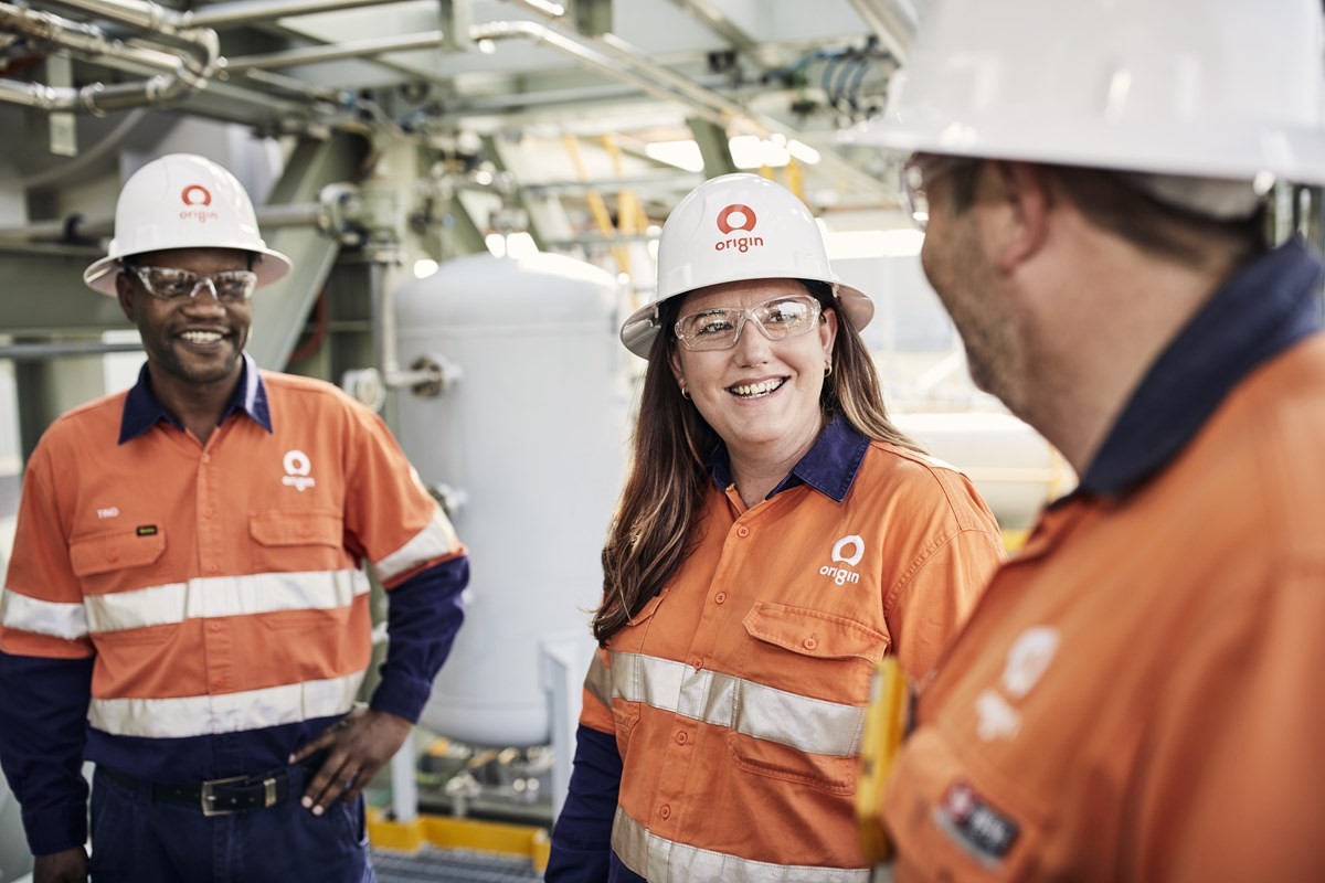 Two males and a female wearing safety gear