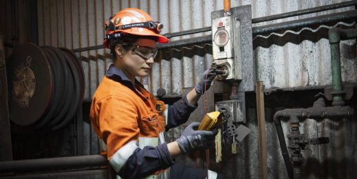 Female worker in safety gear