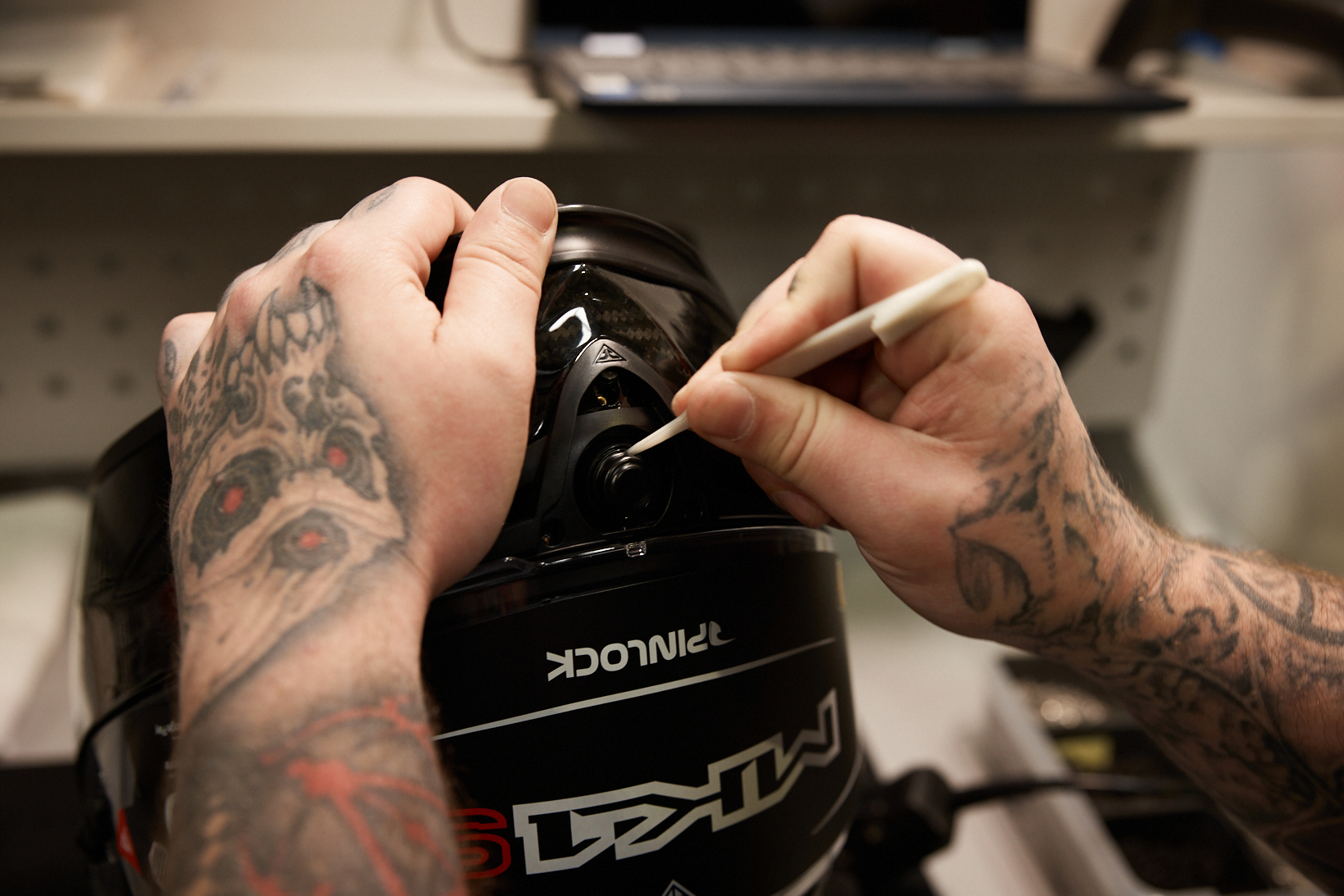 Close-up view of the camera being installed in the helmet