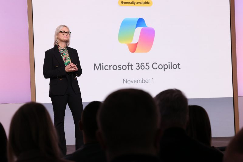 Image of Colette Stallbaumer, Microsoft general manager of Microsoft 365 and Future of Work, speaking on stage.