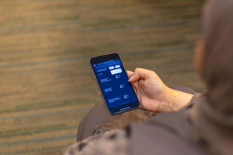 Woman holding a smartphone