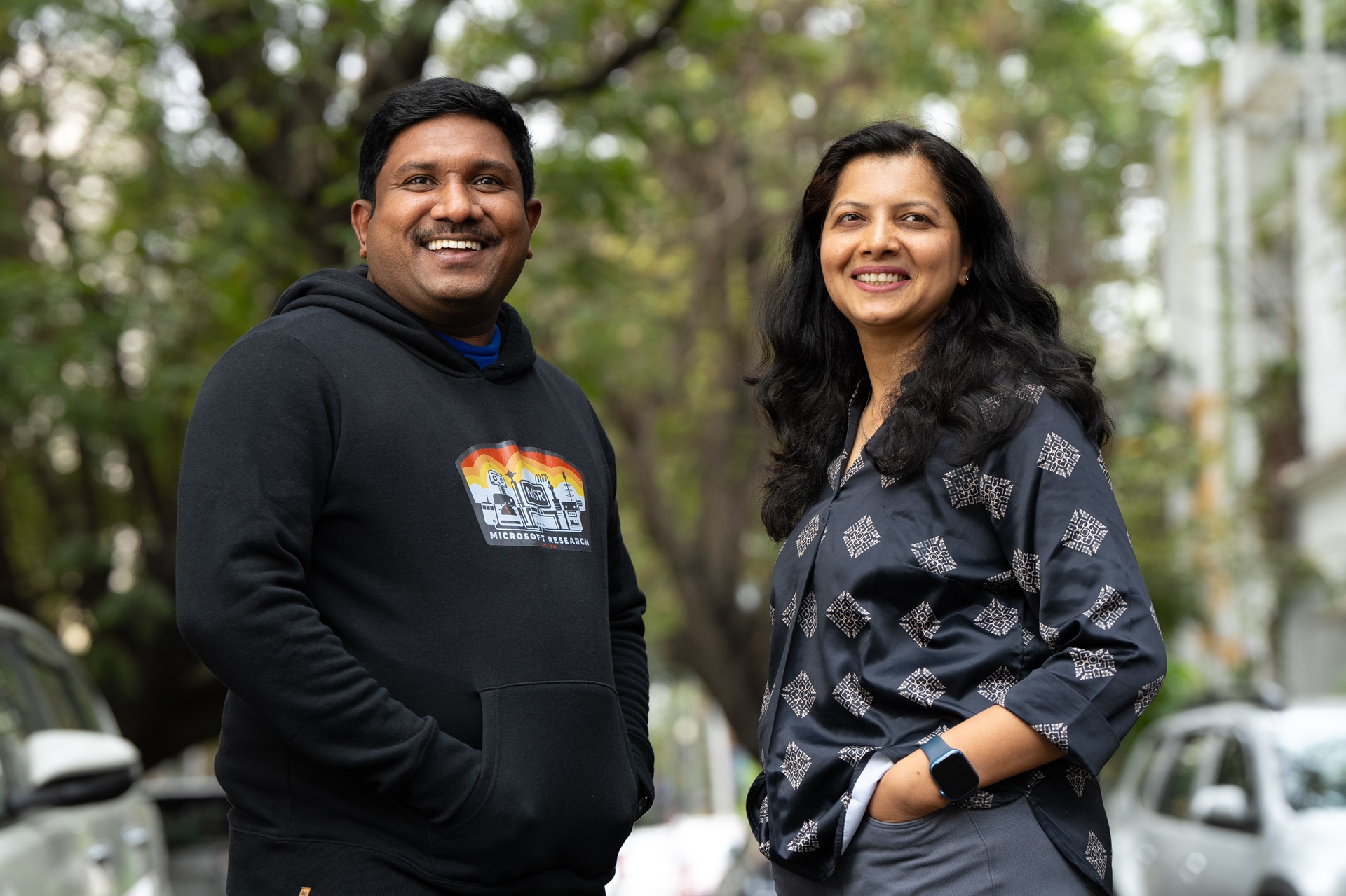 Outdoor portrait of a male and female researcher next to each other 