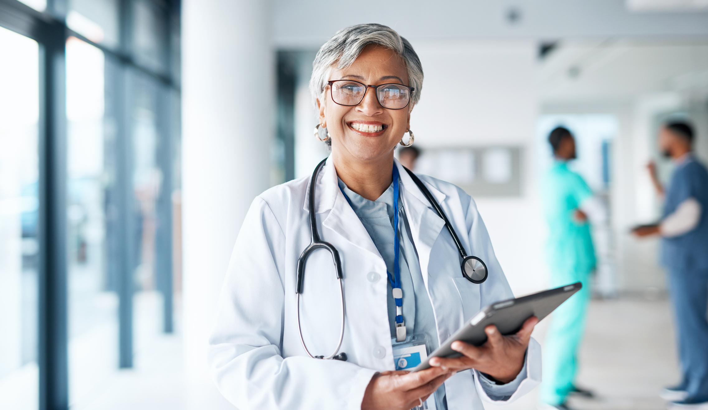 Doctor holding a tablet in a hospital