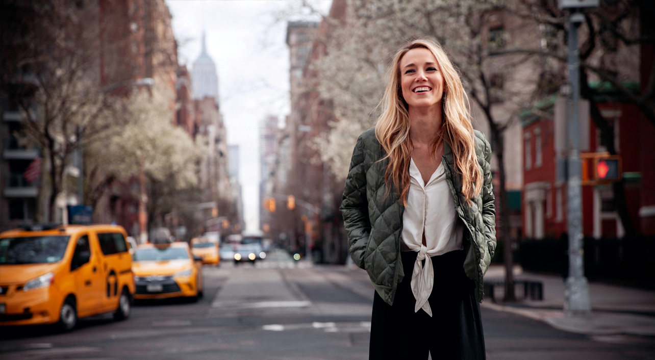 Natasha Franck, CEO of EON, standing on a street in New York City